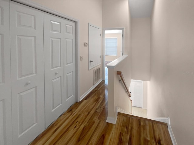 hallway featuring hardwood / wood-style floors