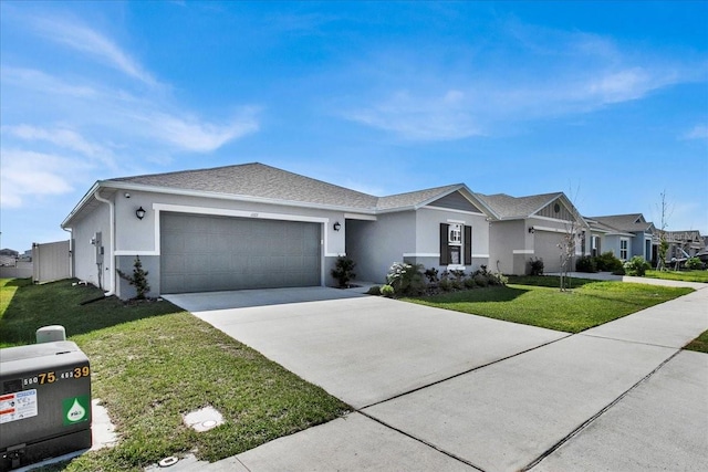 ranch-style house featuring a front yard and a garage