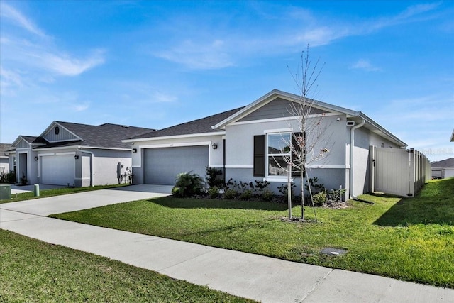 ranch-style house with a garage and a front yard