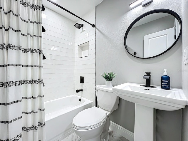 bathroom with shower / tub combo with curtain and toilet