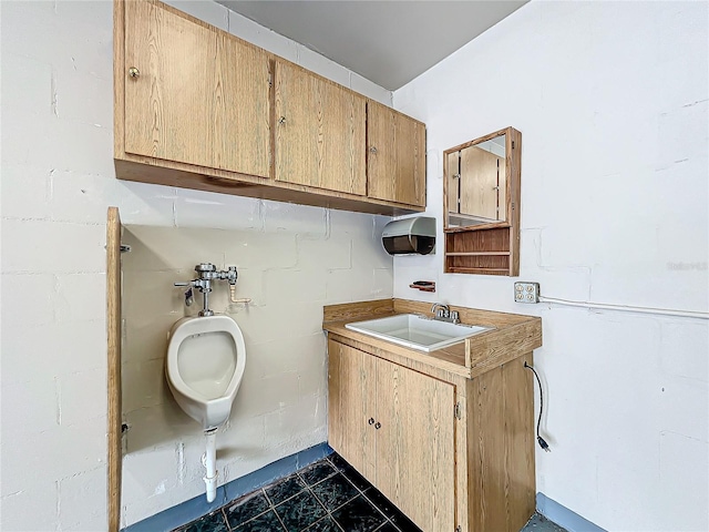 bathroom featuring toilet and sink