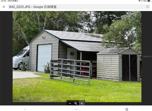 view of outbuilding with a lawn