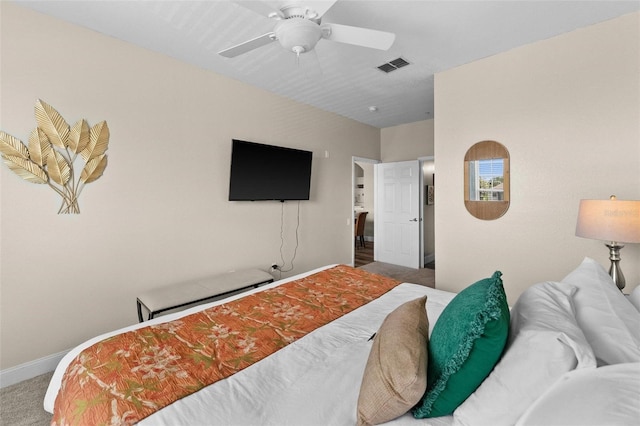 bedroom with ceiling fan and carpet floors