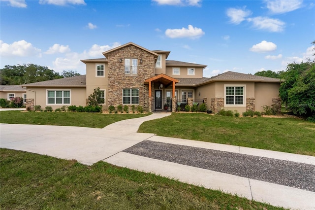 view of front of home featuring a front lawn