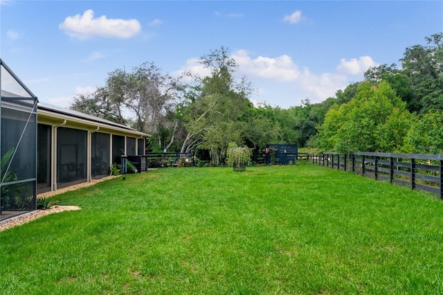 view of yard with a lanai