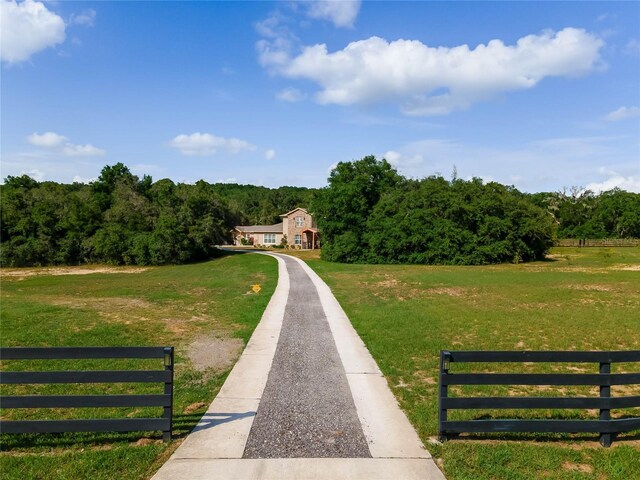 view of community featuring a yard