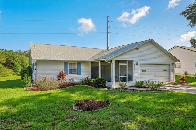 ranch-style home with a garage, a front lawn, and a sunroom