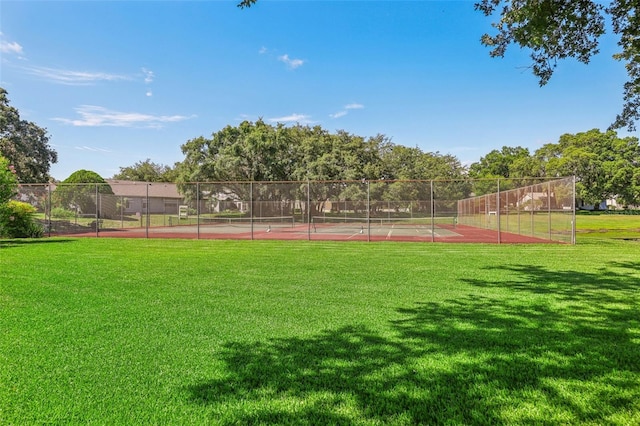 view of yard with tennis court