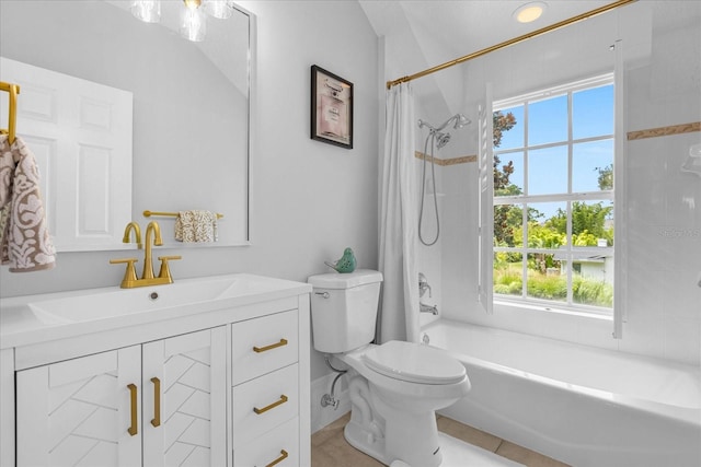 full bathroom with vanity, a healthy amount of sunlight, toilet, and shower / bath combo