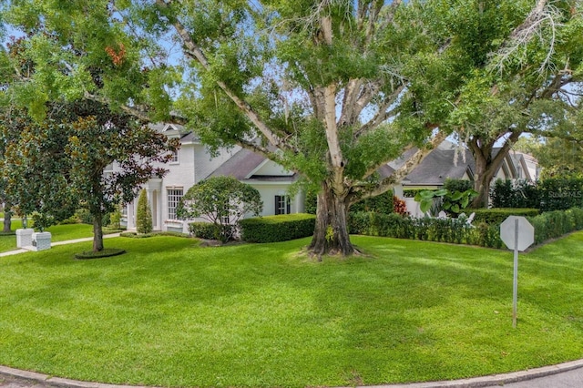 exterior space featuring a front lawn