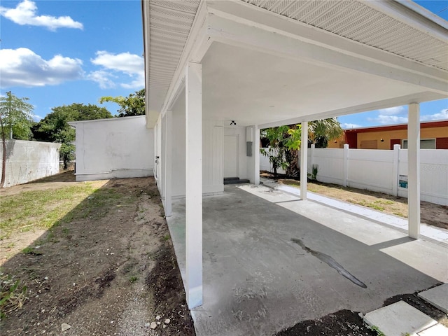 view of patio with a carport