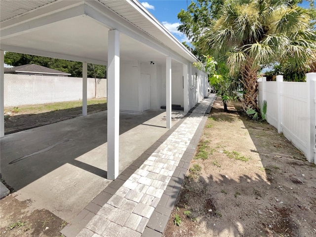 view of yard with a carport