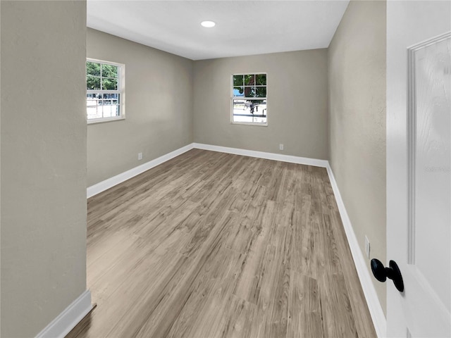 empty room featuring light hardwood / wood-style floors