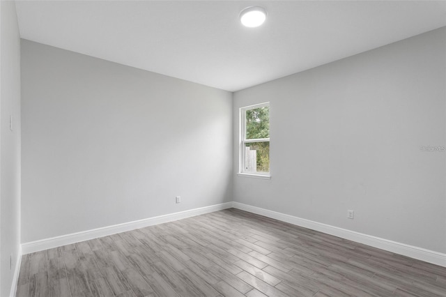 empty room featuring hardwood / wood-style floors