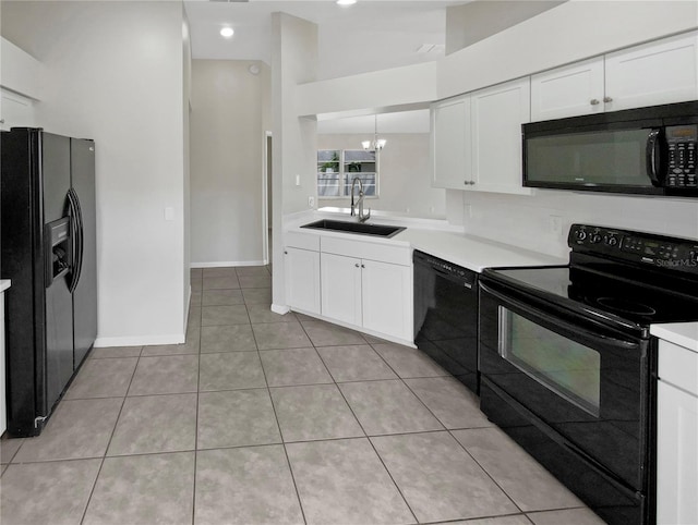 kitchen featuring black appliances, white cabinetry, sink, and high vaulted ceiling