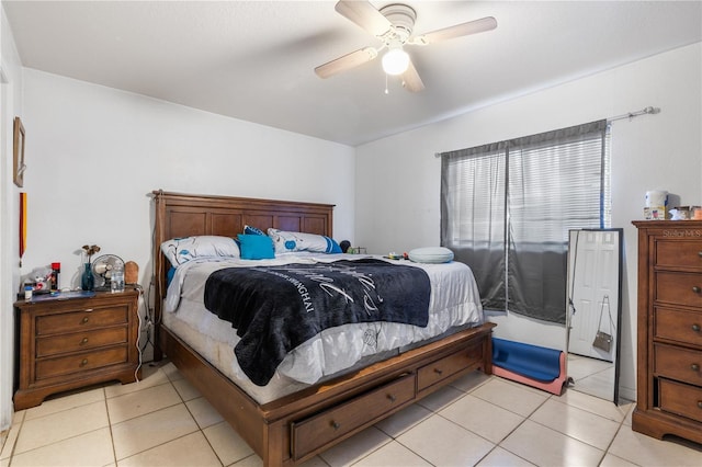 bedroom featuring ceiling fan and light tile patterned floors