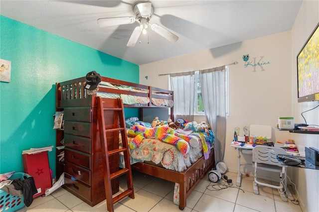 tiled bedroom with ceiling fan