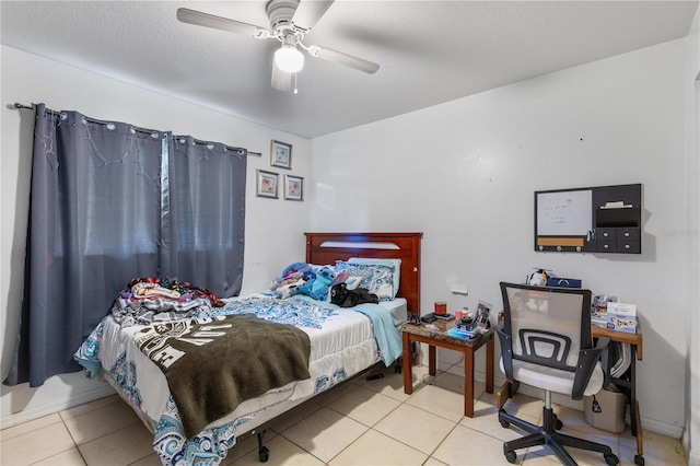 tiled bedroom with ceiling fan