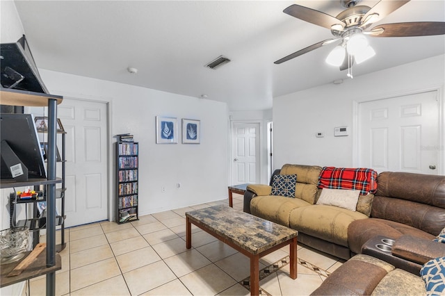 living room with light tile patterned flooring and ceiling fan