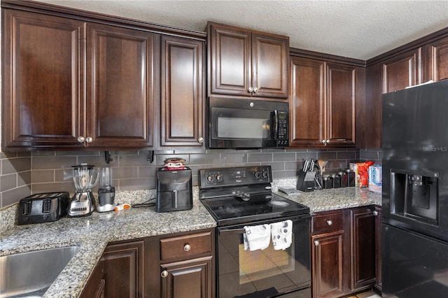 kitchen with tasteful backsplash, dark brown cabinets, and black appliances