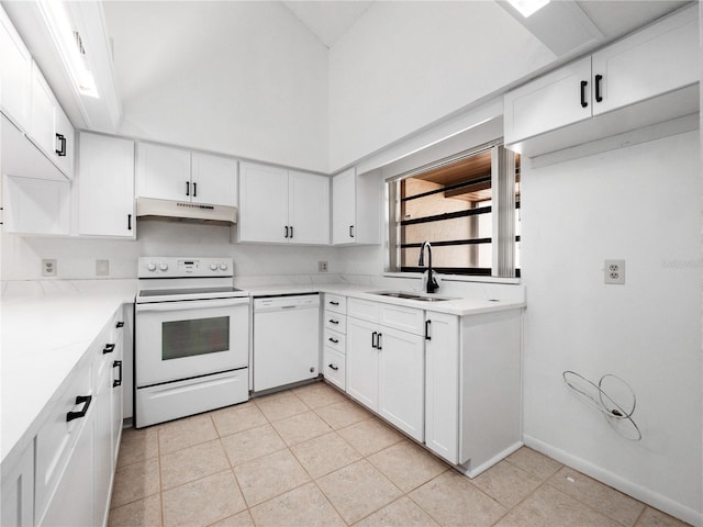 225 Terrace Hill Blvd Unit 1C, Debary, FL 32713 - kitchen featuring white appliances, a sink, under cabinet range hood, light countertops, and white cabinets