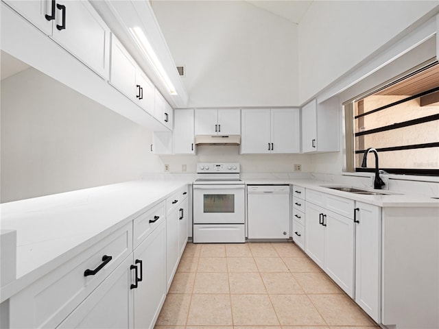 225 Terrace Hill Blvd Unit 1C, Debary, FL 32713 - kitchen with white appliances, a sink, under cabinet range hood, white cabinetry, and light tile patterned floors