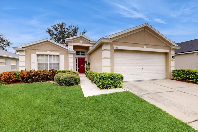 ranch-style house featuring a front lawn and a garage