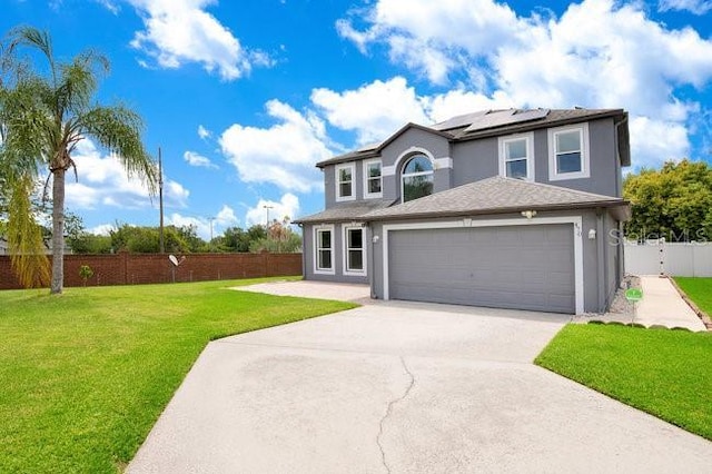 front facade with a front lawn and solar panels