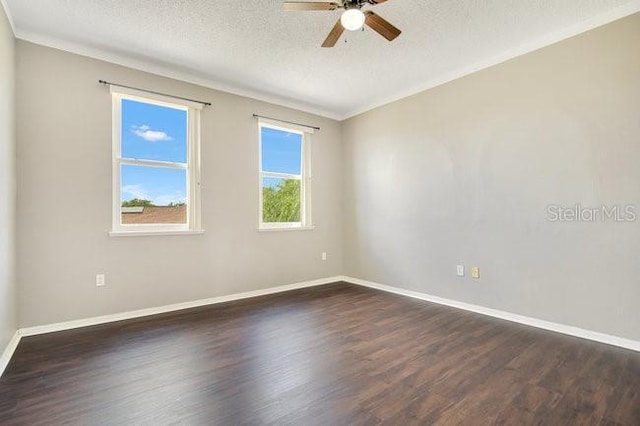 spare room featuring a textured ceiling, dark hardwood / wood-style flooring, and ceiling fan