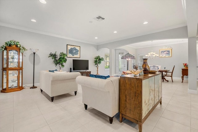 tiled living room featuring a notable chandelier and crown molding