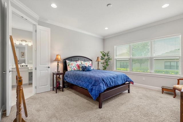 carpeted bedroom with connected bathroom and crown molding