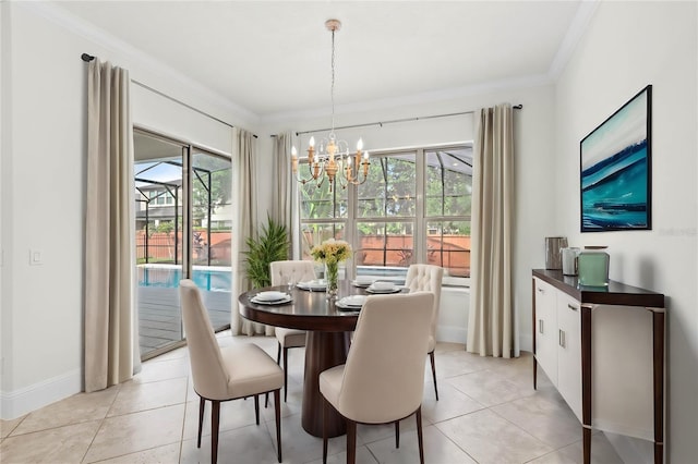 tiled dining area featuring a notable chandelier, plenty of natural light, and crown molding