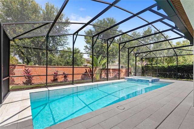 view of pool featuring a lanai and a patio area