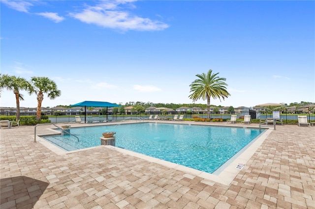 view of pool featuring a patio