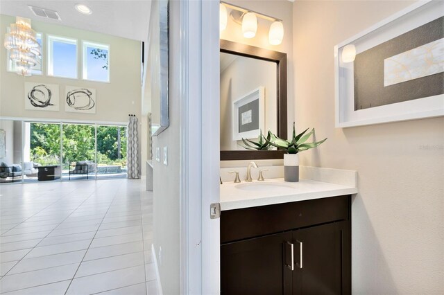 bathroom with vanity and tile patterned flooring