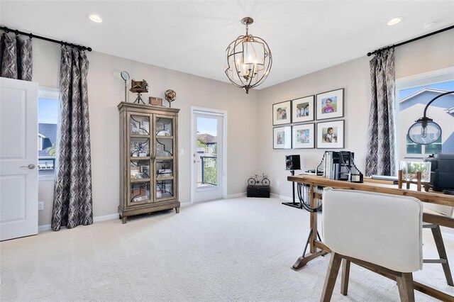 carpeted office featuring a notable chandelier