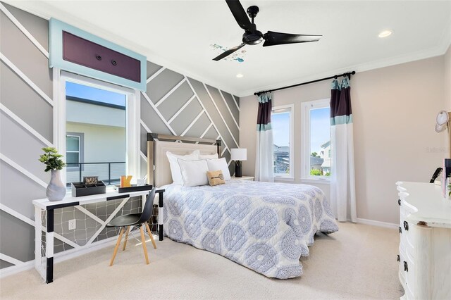 bedroom with ceiling fan and light colored carpet