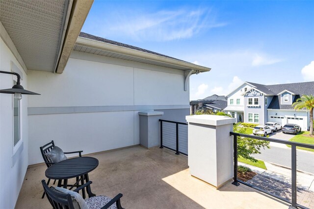 view of patio / terrace with a balcony