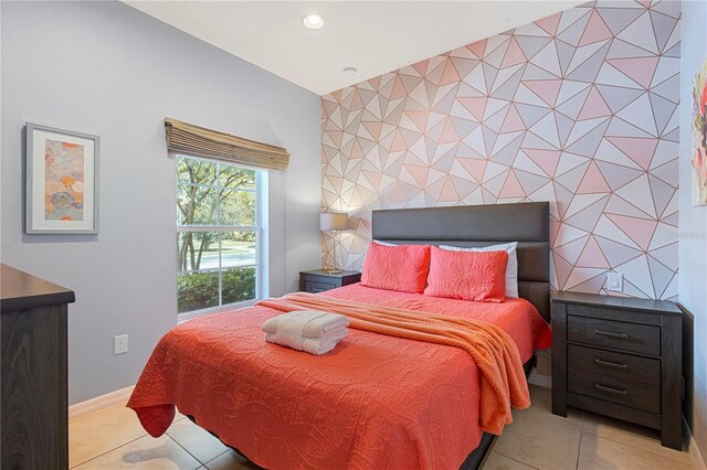 bedroom featuring light tile patterned floors