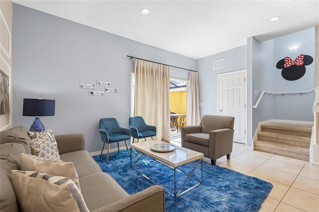 living room with tile patterned flooring