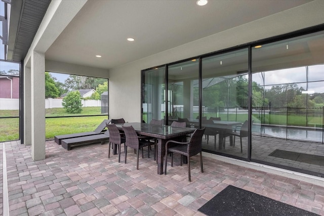 sunroom featuring a healthy amount of sunlight