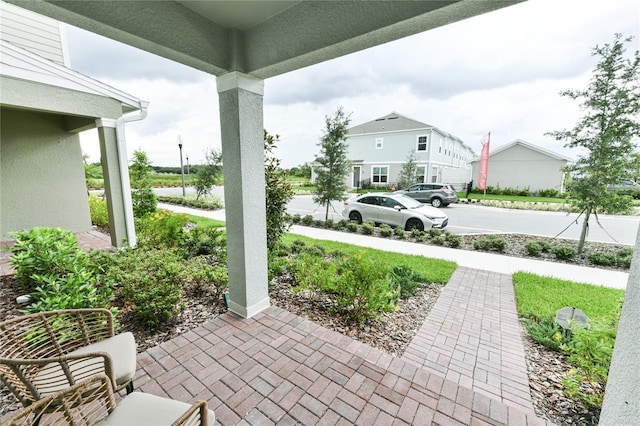 view of patio featuring a porch