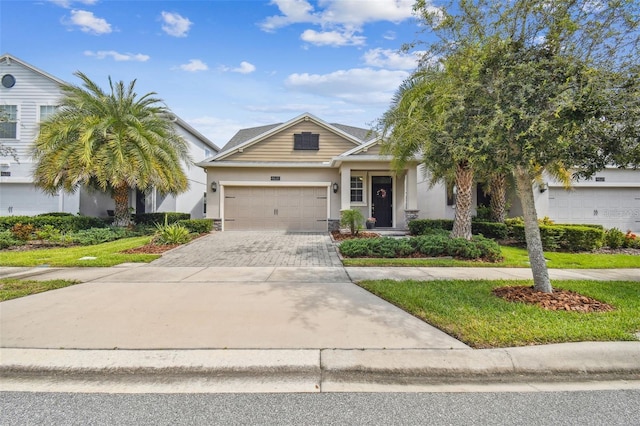 view of front of property featuring a garage