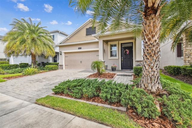 view of front of property with a garage