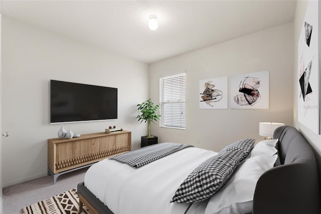 bedroom featuring carpet flooring