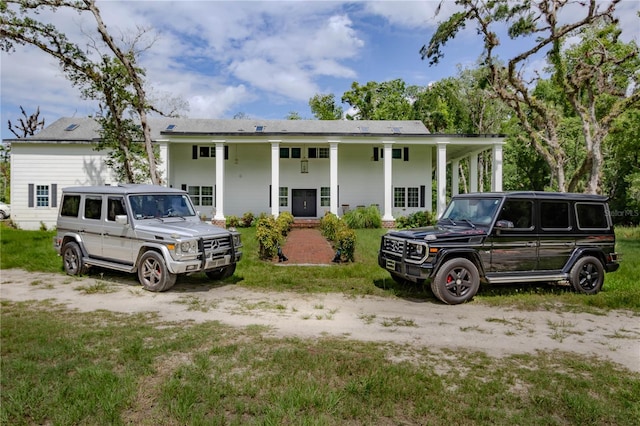 view of front of home featuring covered porch