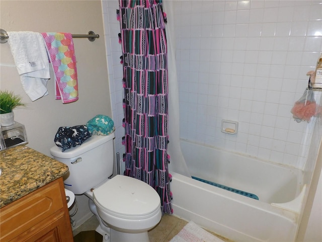 full bathroom with vanity, shower / bath combo with shower curtain, and toilet