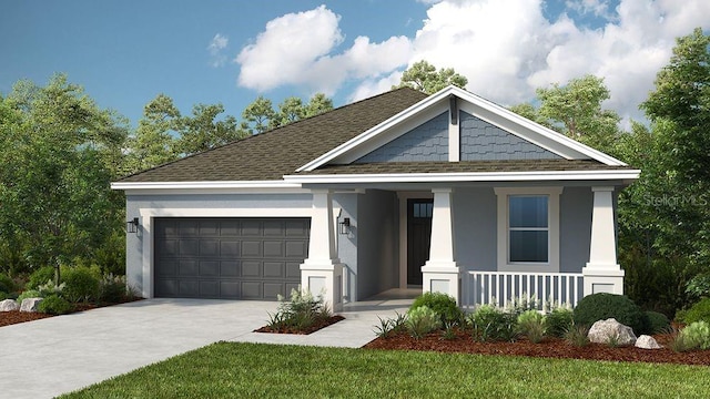 view of front of house featuring a front lawn, covered porch, and a garage