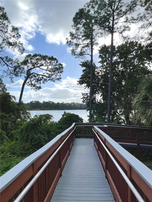 view of community with a water view