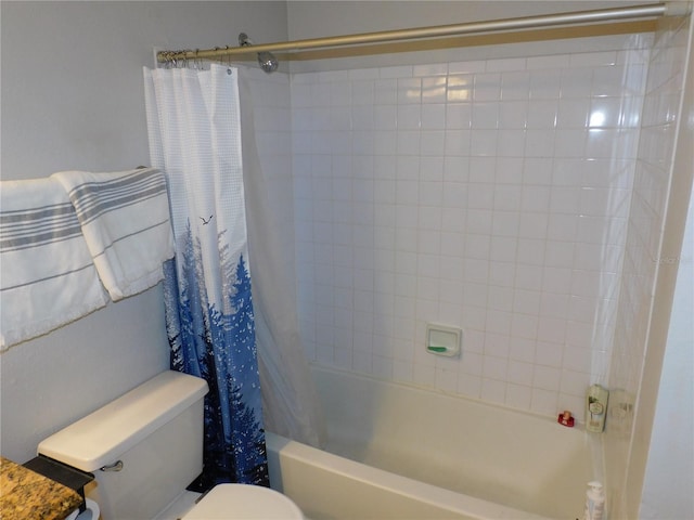 bathroom with toilet and shower / tub combo